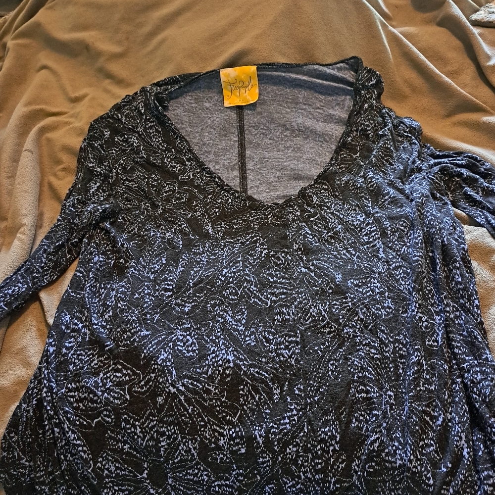FREE PEOPLE long sleeve shirt. Long in front short in back